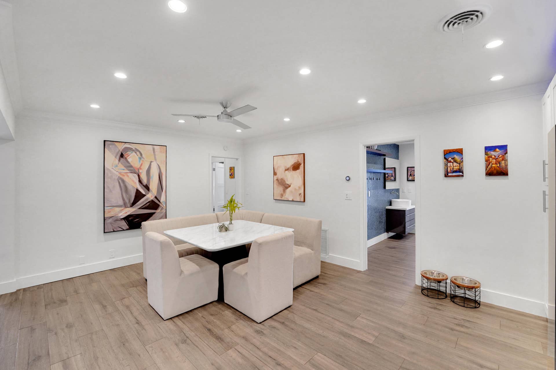 380 NW 35TH Court, Oakland Park, FL 33309 Wood-finish flooring, recessed lighting, and a modern ceiling fan