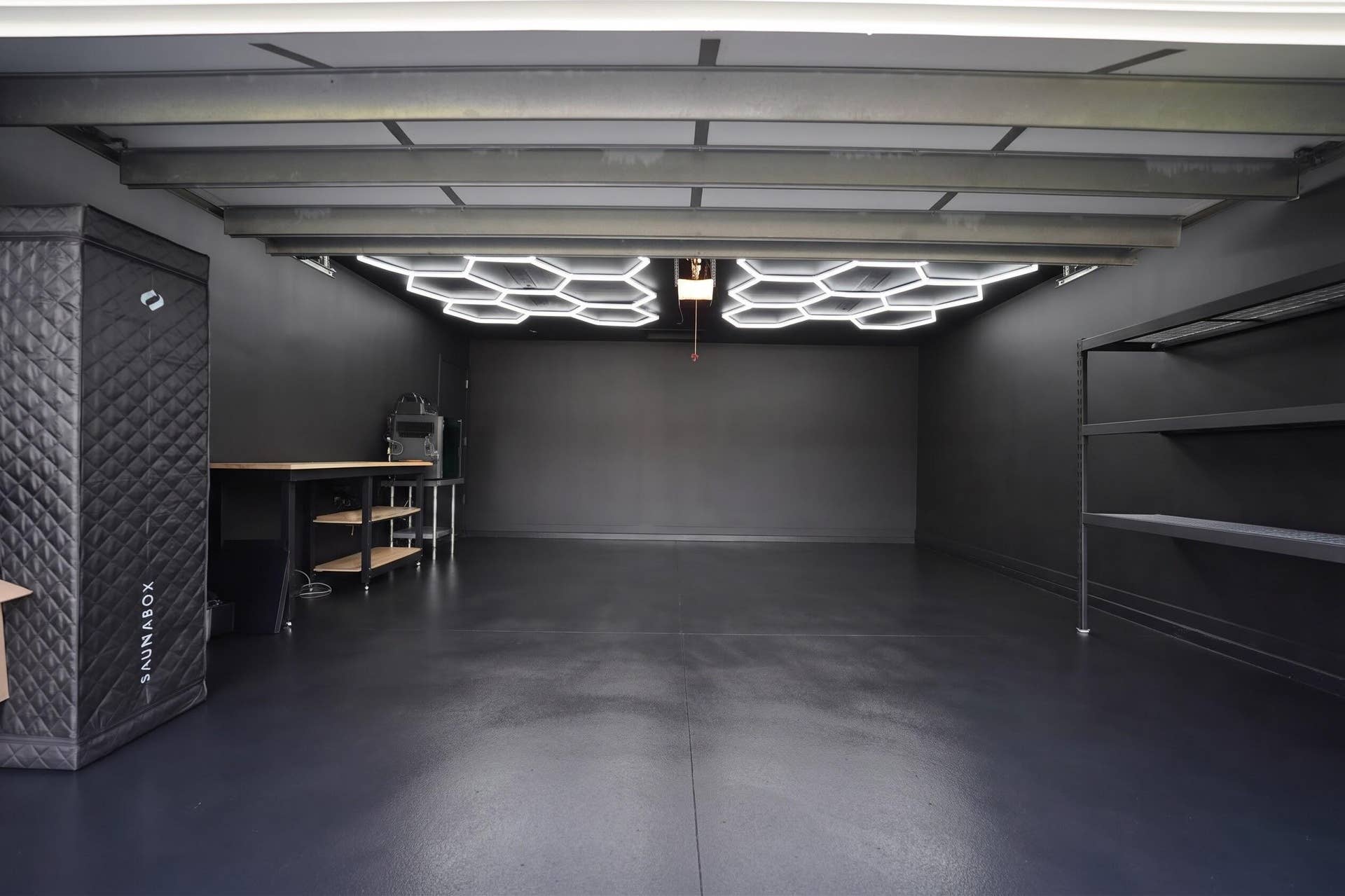 380 NW 35TH Court, Oakland Park, FL 33309 Updated garage with New paint, epoxy flooring and modern lighting.