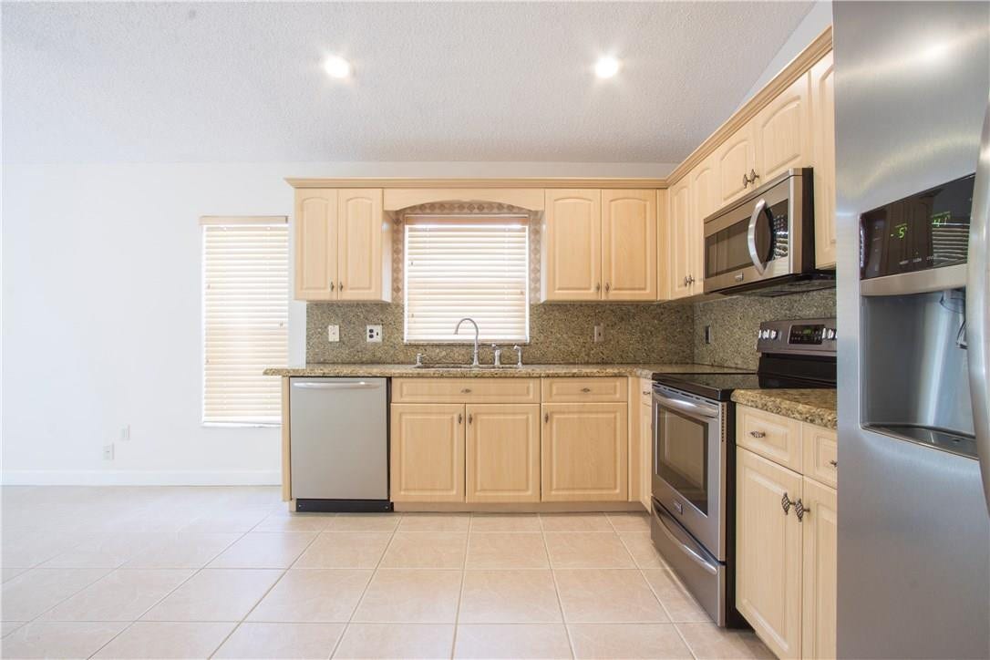 9644 Tavernier Drive, Boca Raton, FL 33496 9644 Tavernier Drive, Boca Raton, FL 33496