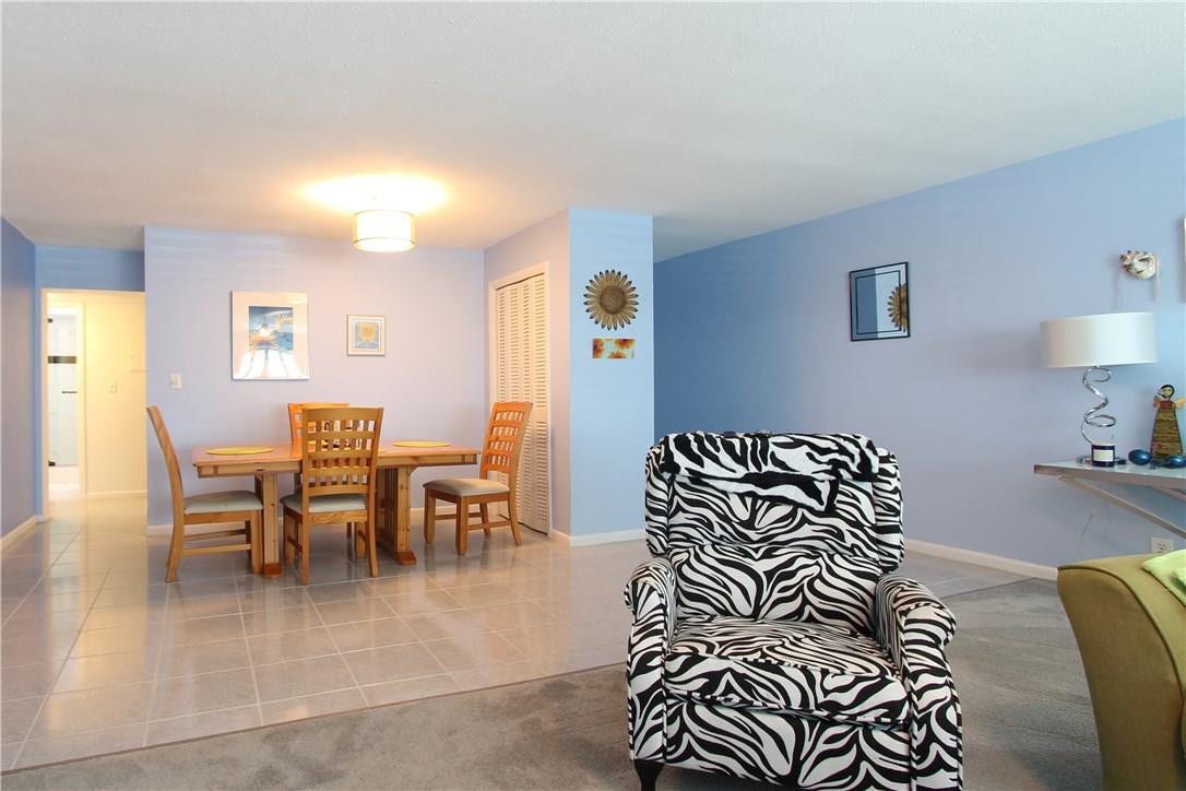 1450 N Riverside Drive, #201, Pompano Beach, FL 33062 DINING AREA OFF LIVING ROOM FOYER AREA TO FRONT DOOR