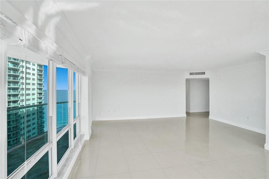 3400 Galt Ocean Drive, #1509 S, Fort Lauderdale, FL 33308 Facing towards the entrance of the apartment, with your back to all of the windows. The balcony is to the left.