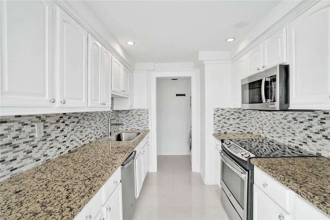 3400 Galt Ocean Drive, #1509 S, Fort Lauderdale, FL 33308 The full sized washer and dryer is housed in the laundry room at the far end of the kitchen. A pocket door closes off and conceals this laundry room. This laundry room area was custom built in by the owners.
