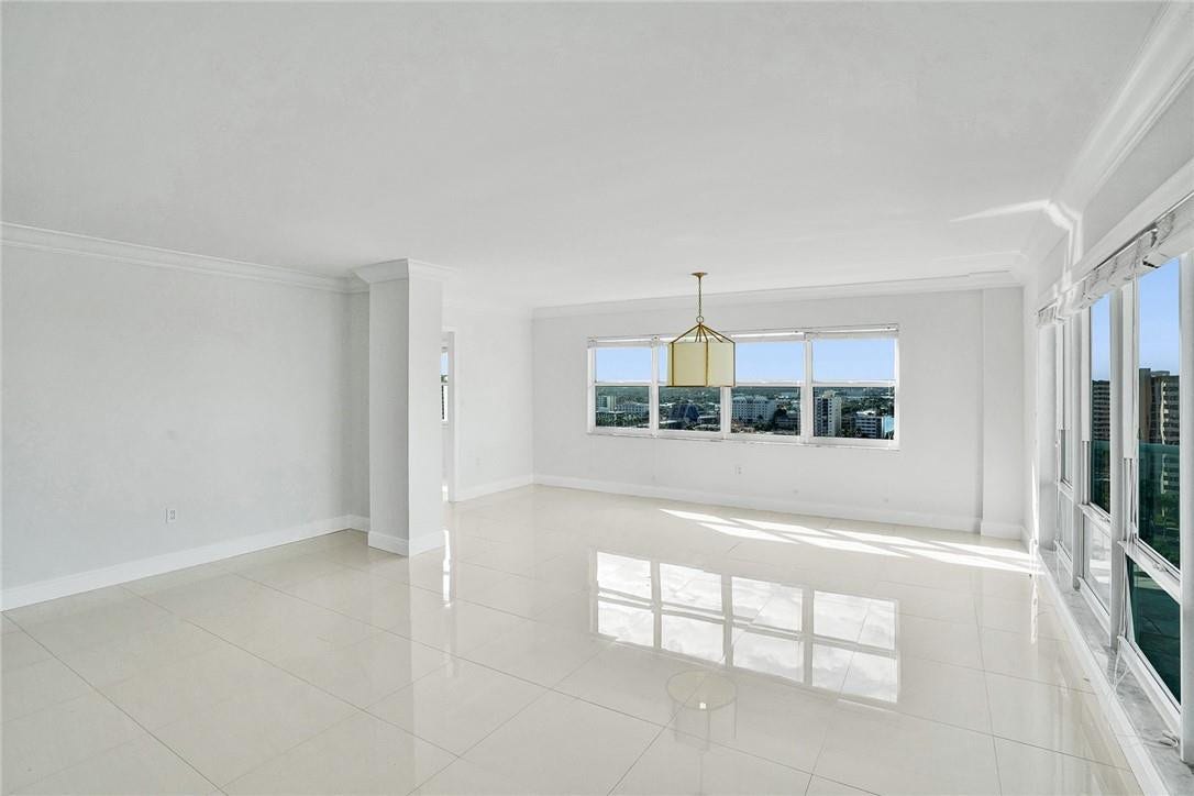 3400 Galt Ocean Drive, #1509 S, Fort Lauderdale, FL 33308 The doorway opening to the left of the west facing wall windows leads into the kitchen. The area in front of the windows is typically used as the dining room area.