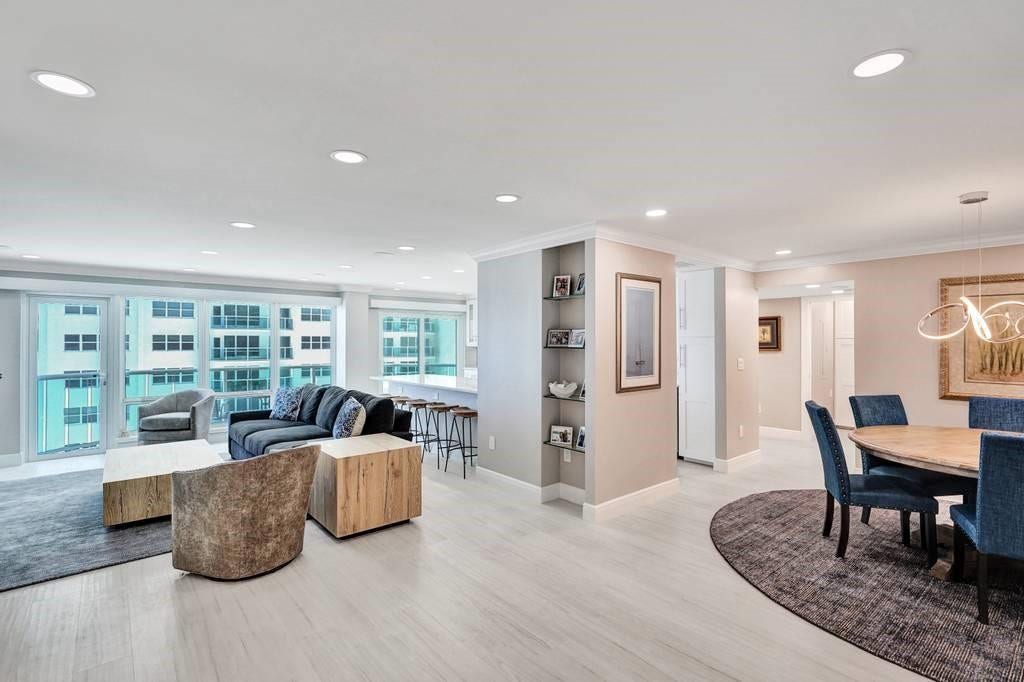 Porcelain wood grain tile runs thru out the whole apartment. Recessed lighting, new crown molding, new baseboard, new doors and new hardware is in place in every room. Electrical is new.