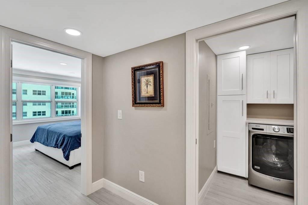 The owner configured this second bedroom area so that it could house a laundry room, which can be closed off with a pocket door.