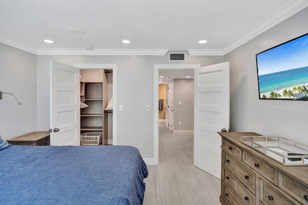 The open doorway on the right leads into the second bathroom.