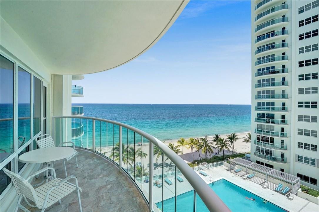 This could be your view! This is sunny, south/south east facing 2 bedroom, 2 bath beautifully updated apartment; it is the second one in from the ocean front corner, with lovely ocean and pool deck views.