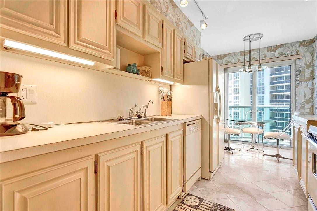 3400 Galt Ocean Drive, #1104 S, Fort Lauderdale, FL 33308 There is an eat in area in the kitchen with lovely views of the ocean, the beach, and the grounds of the L'Hermitage. The kitchen light fixture is excluded from the sale.