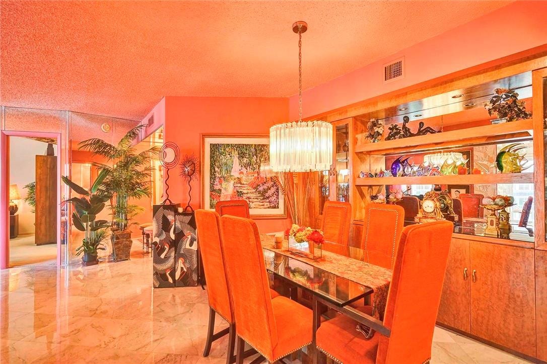 3400 Galt Ocean Drive, #1104 S, Fort Lauderdale, FL 33308 In the dining room: The kitchen is to the left, and the doorway leads into the main bedroom.