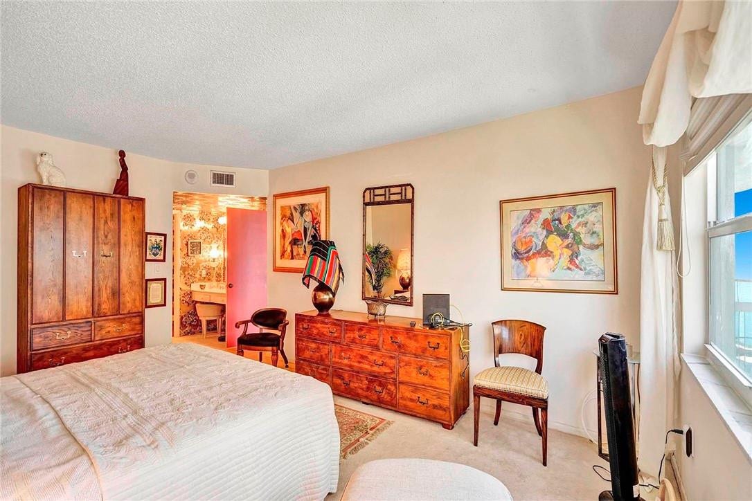 3400 Galt Ocean Drive, #1104 S, Fort Lauderdale, FL 33308 The main bathroom is located to the left of the open door.
