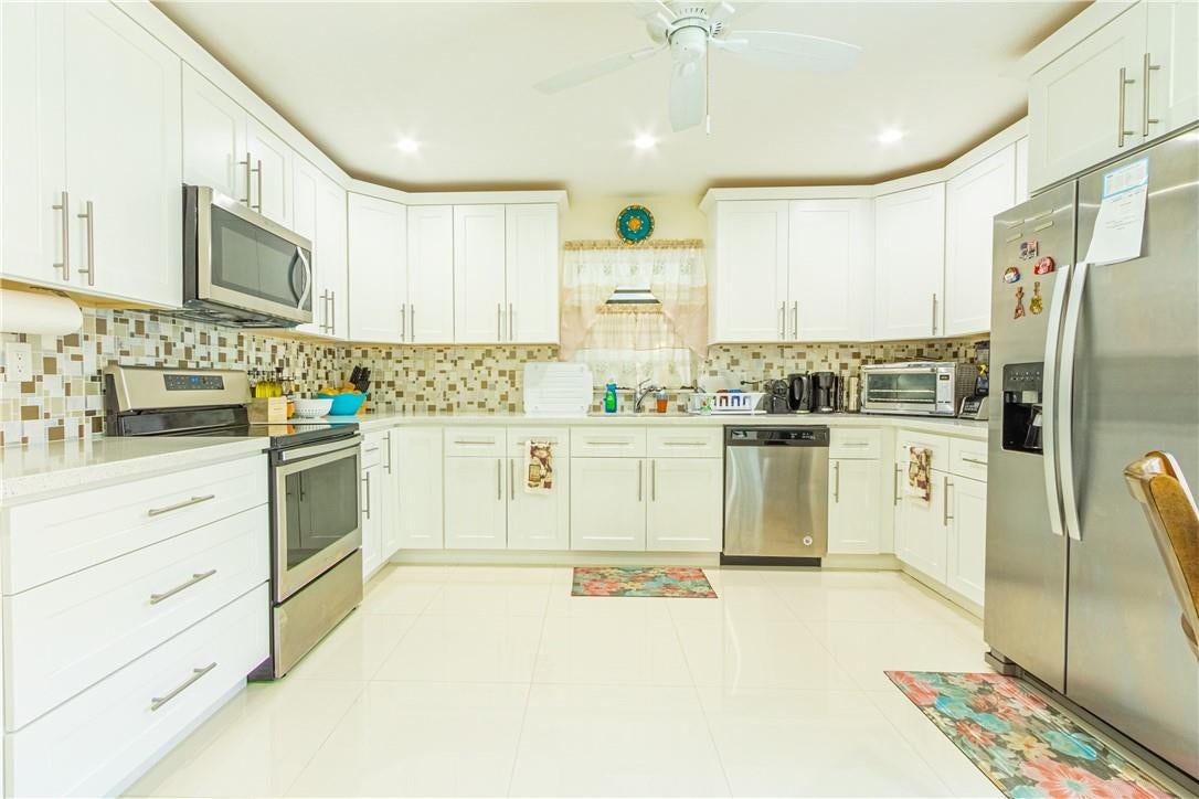 7904 Hibiscus Way, Tamarac, FL 33321 7904 Hibiscus Way, Tamarac, FL 33321