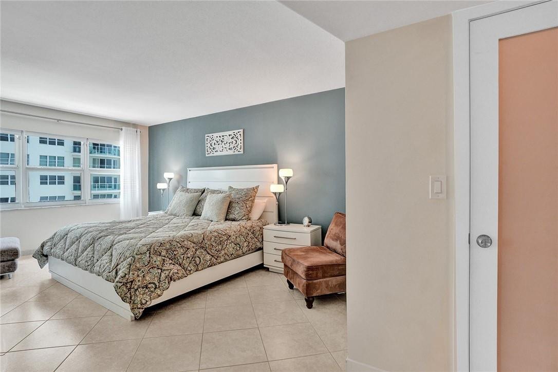 As you enter the primary bedroom, the door to the walk in closet is to your right.