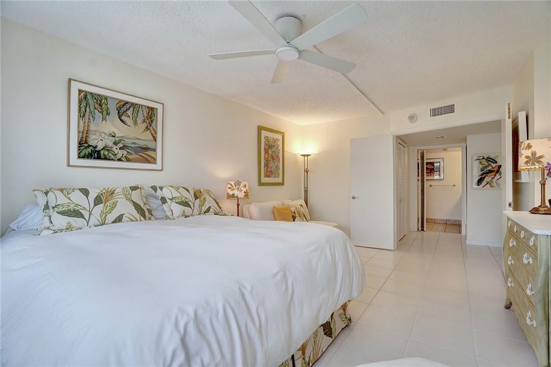 The primary bathroom is straight ahead. The walk in closet is right before that, to the left. Note the double doors that lead into the bedroom.