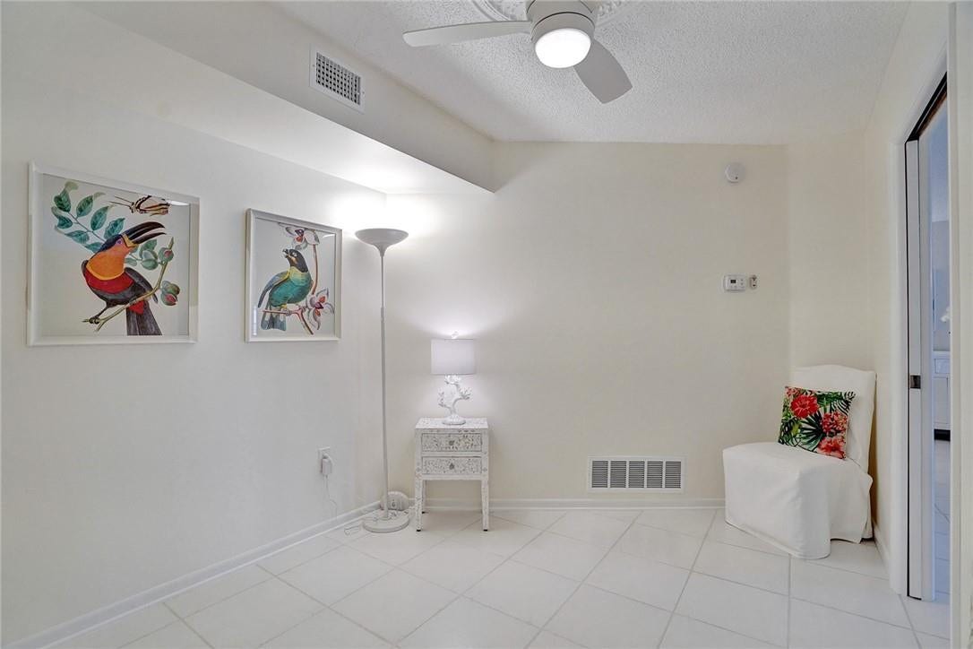 Bonus room; Perfect for a second bedroom, office or den. Note the pocket door.