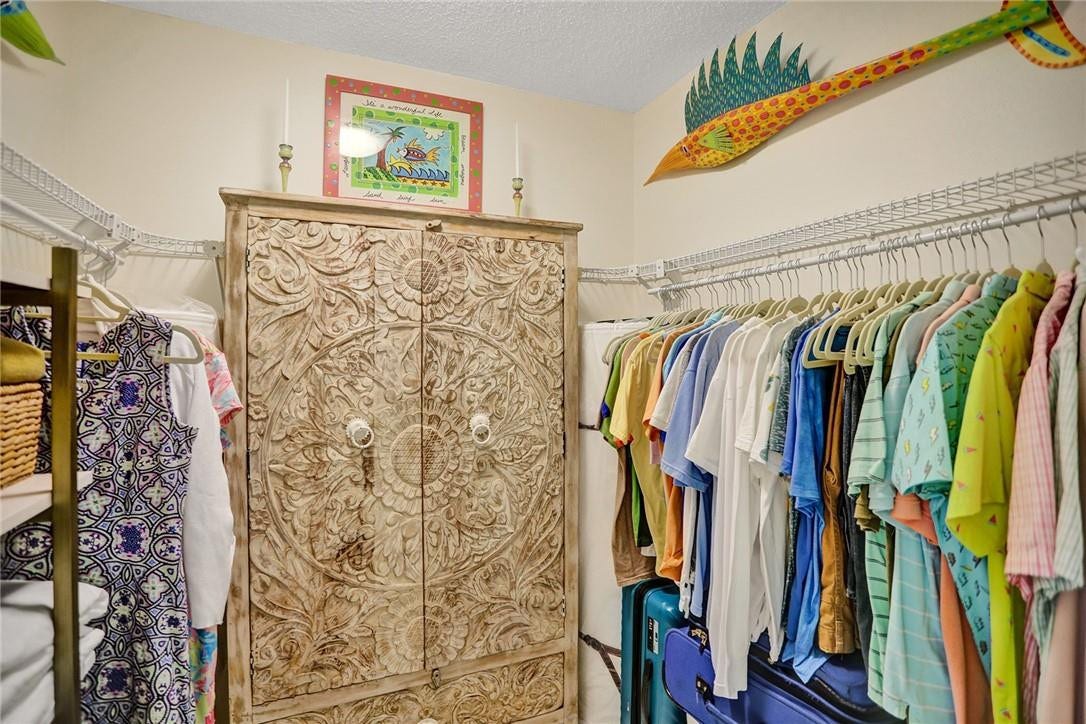 The primary bedroom walk in closet.