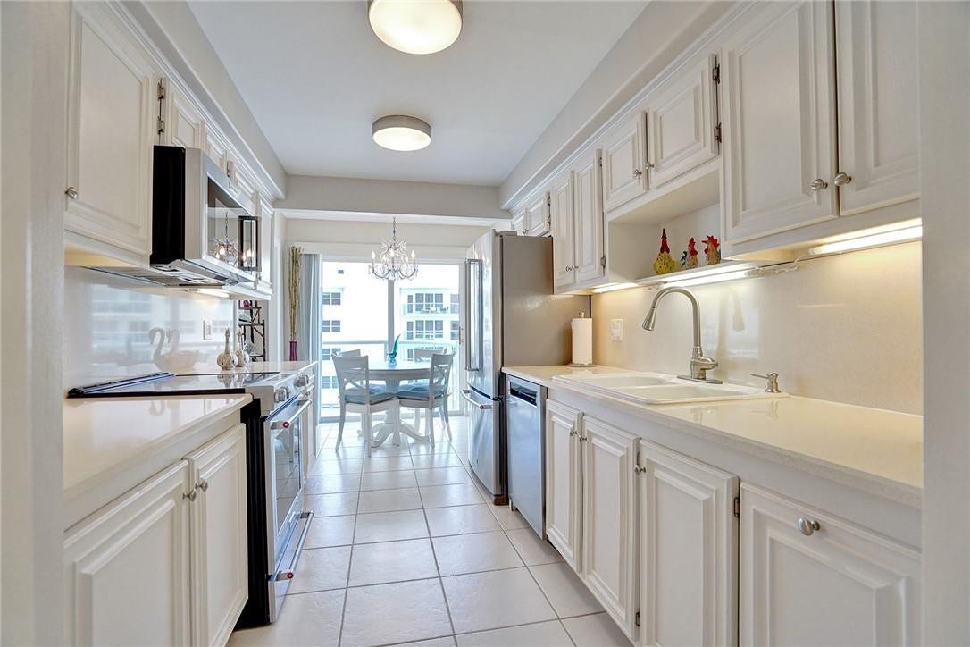 The stainless appliances are Kitchen Aid. They are rarely used as the owner is not here full time. There is plenty of cabinet space.