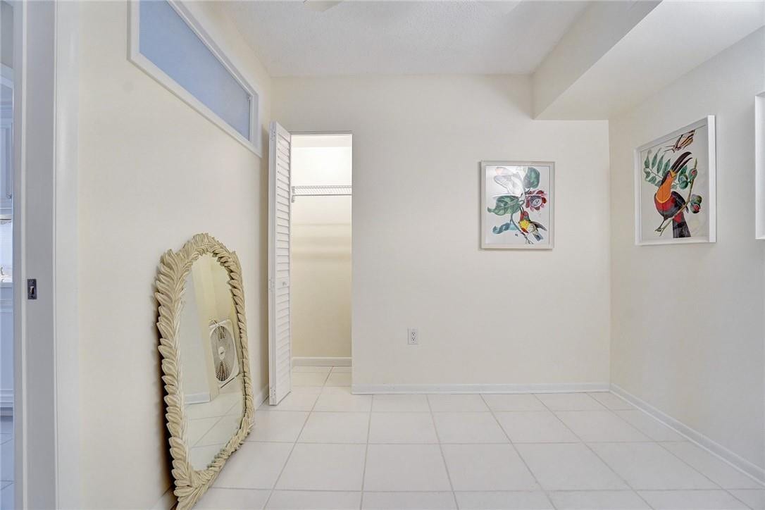 The bonus room has a lit closet and a window.