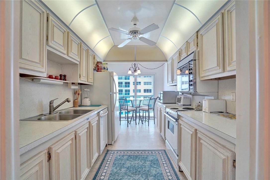 3400 Galt Ocean Drive, #703 S, Fort Lauderdale, FL 33308 The sliding doors in the kitchen also lead out to the balcony.