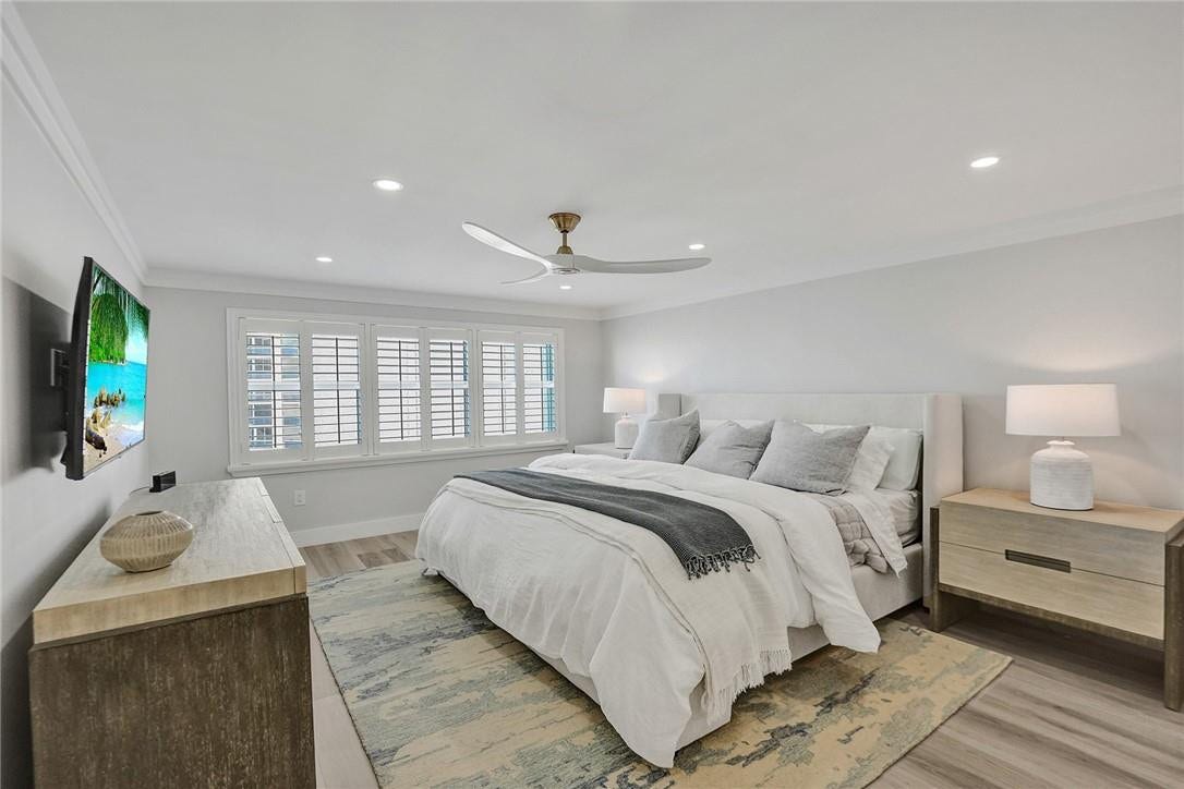 The primary bedroom has recessed lighting, plantation shutters and gorgeous ocean views from your bed.