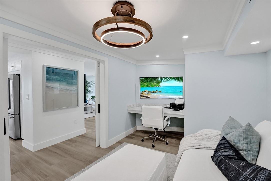 Sliding doors allow for privacy in this bonus room.