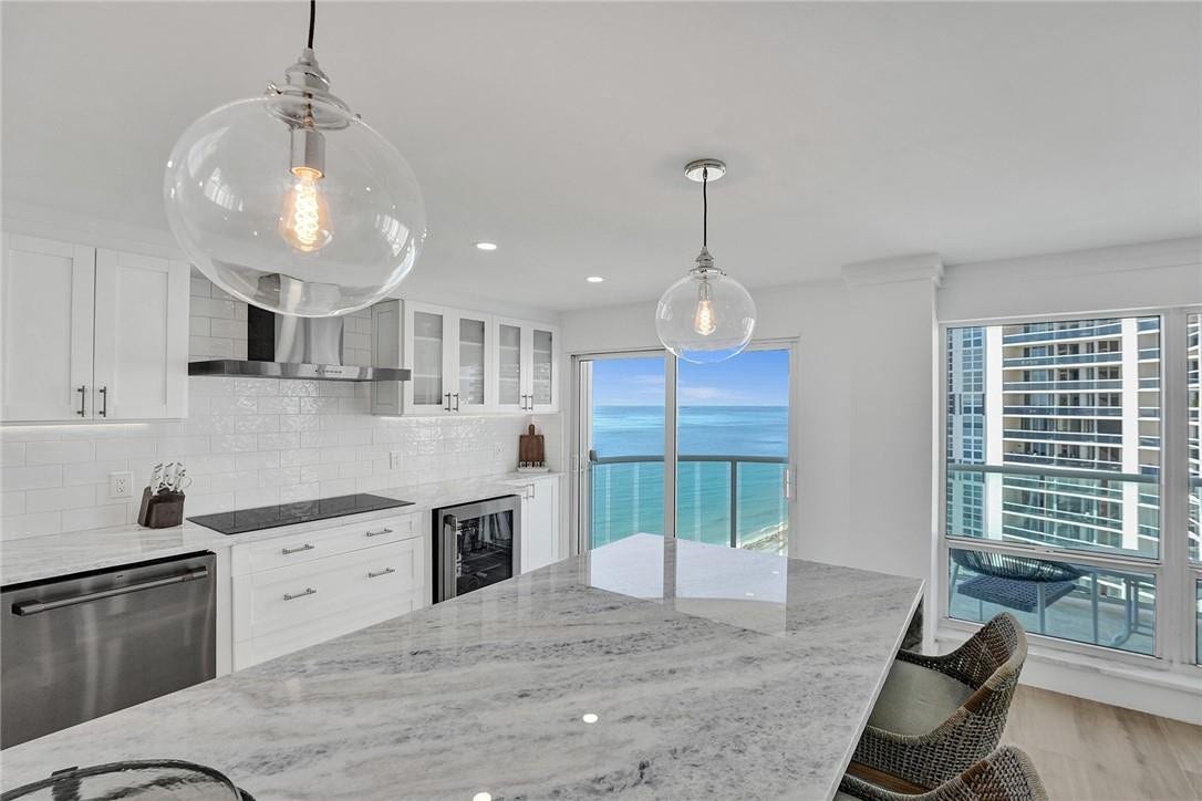 The kitchen has beautiful ocean views and easy access to the balcony. This apartment faces south/southeast, so it is bright and sunny.