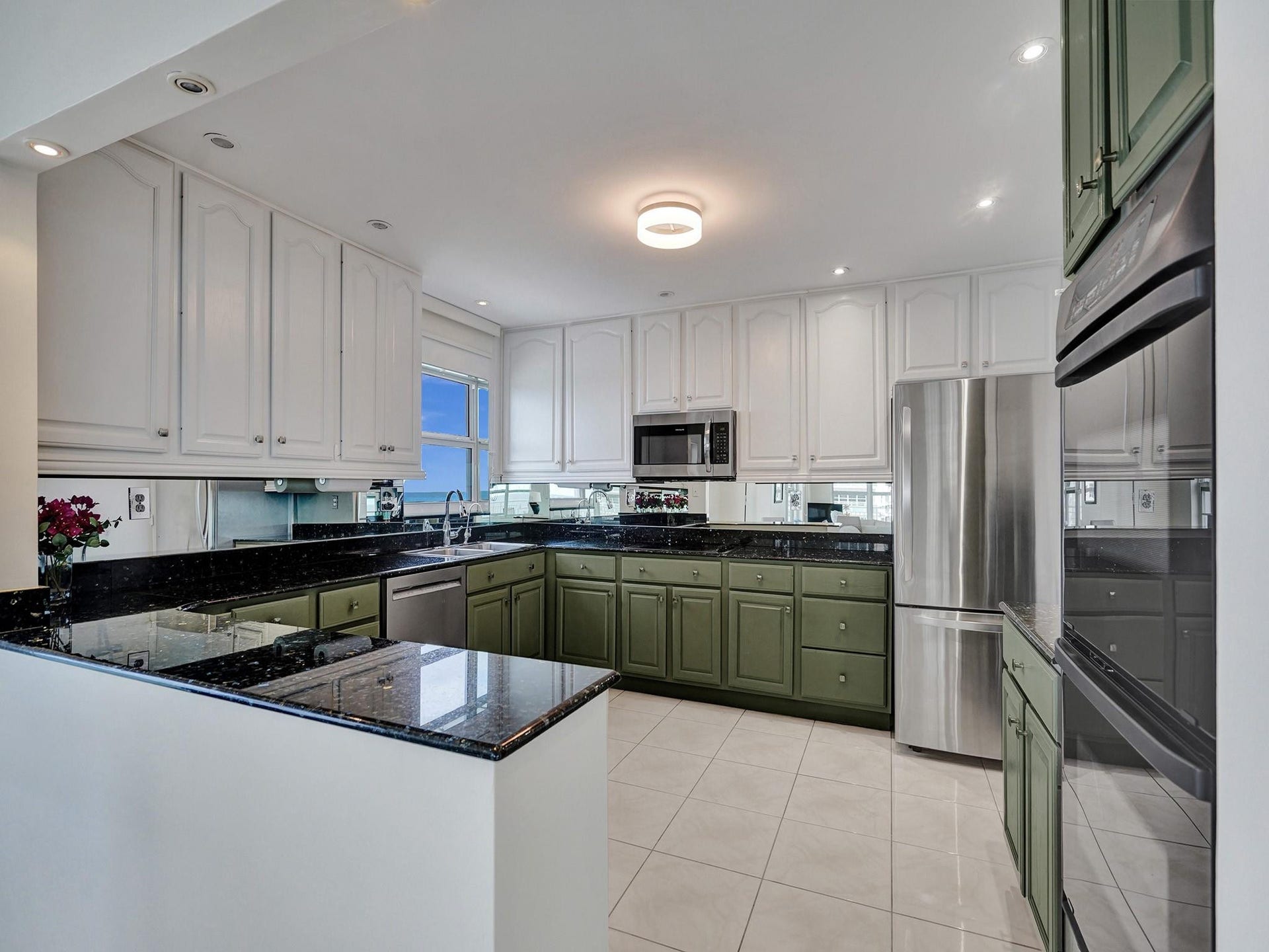 3850 Galt Ocean Drive, #711, Fort Lauderdale, FL 33308 open kitchen with granite counter tops and new SS appliances
