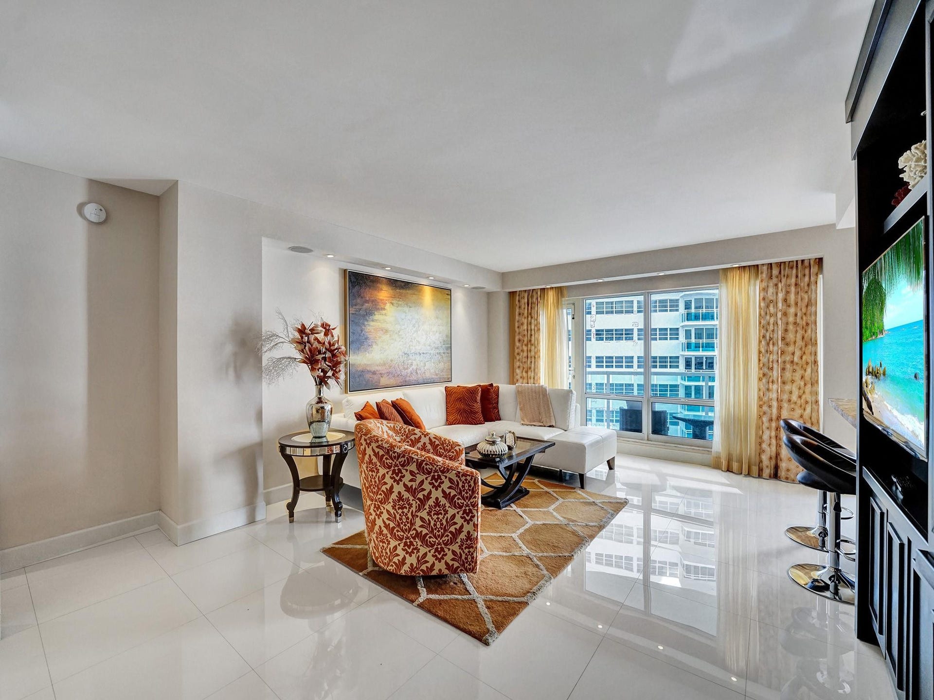 This beautiful flooring runs thru out the main living areas. The window treatments are all custom made.