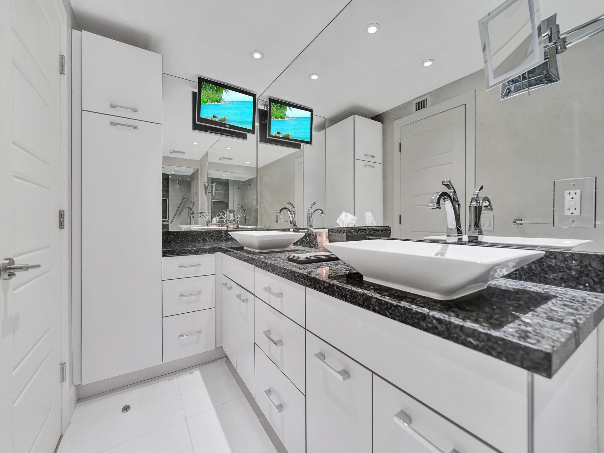 This bathroom has lots of storage.