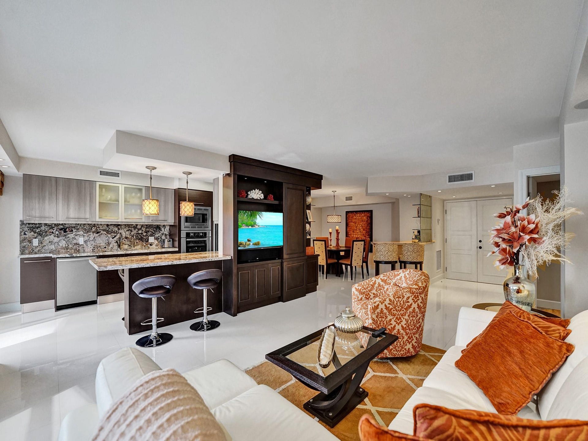 The kitchen wall was opened up, which gives this apartment a very open and spacious feeling.