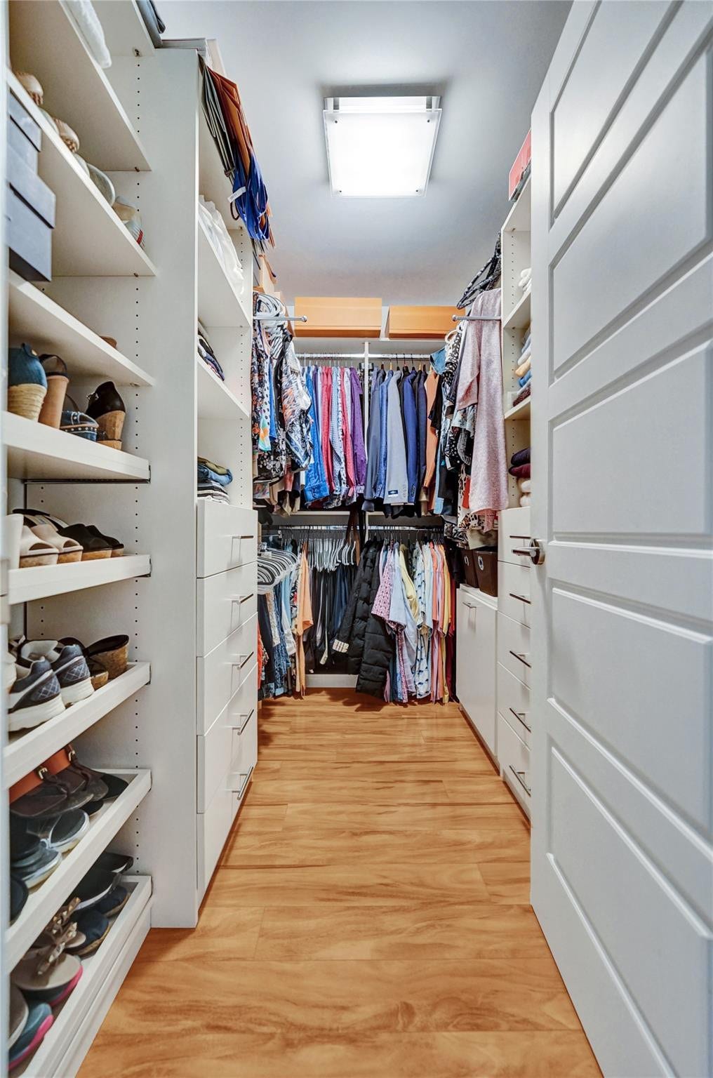 This primary bedroom has been redesigned and has lots of storage.
