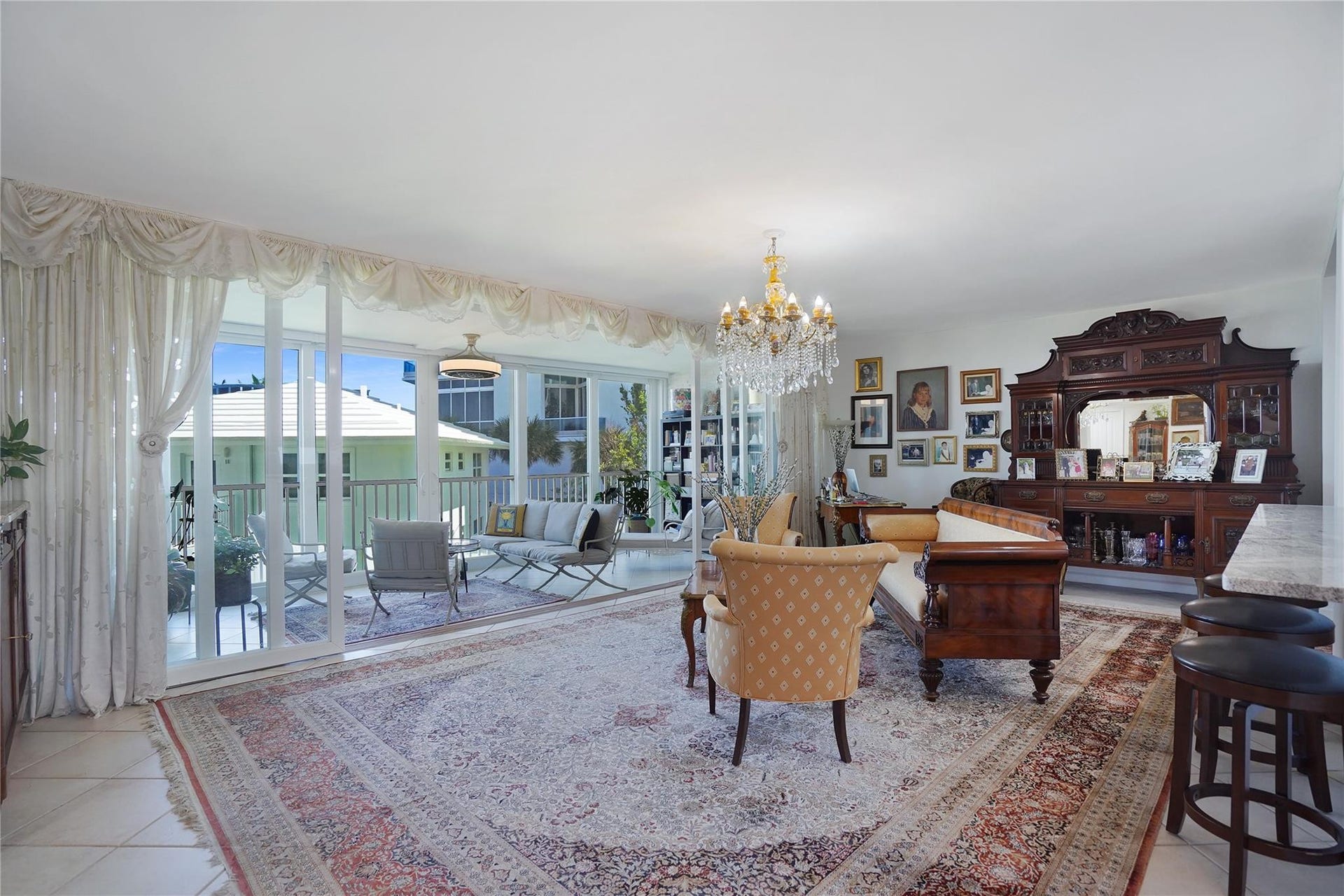 1530 S Ocean Boulevard, #203, Lauderdale By The Sea, FL 33062 Open and airy, and lots of light. The living room chandelier does not convey with the sale.
