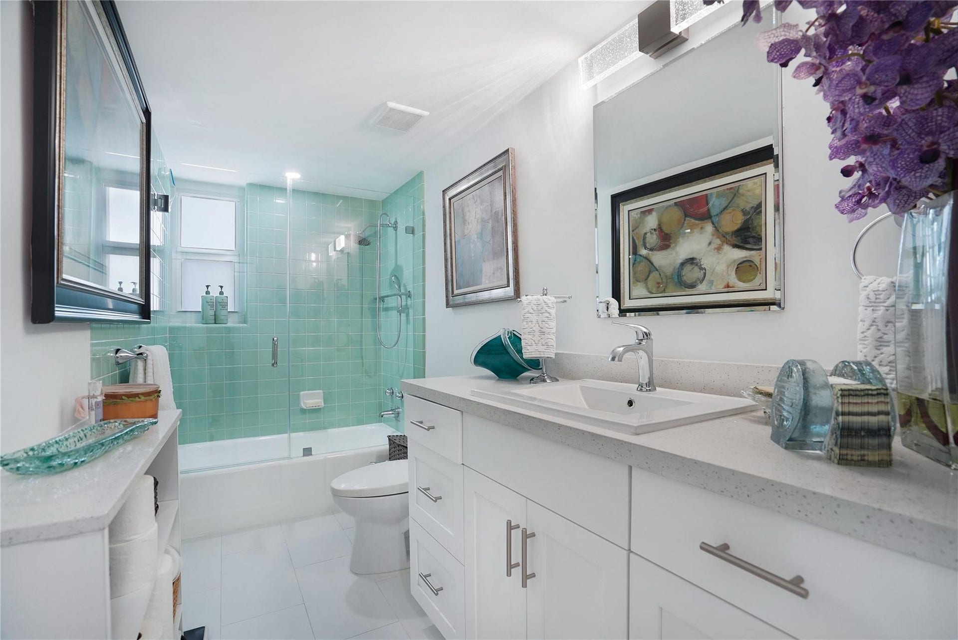 1530 S Ocean Boulevard, #203, Lauderdale By The Sea, FL 33062 Once again, the owner loved and kept the bathroom tiles, and she renovated the rest of the bathroom with quartz countertops and new fixtures.