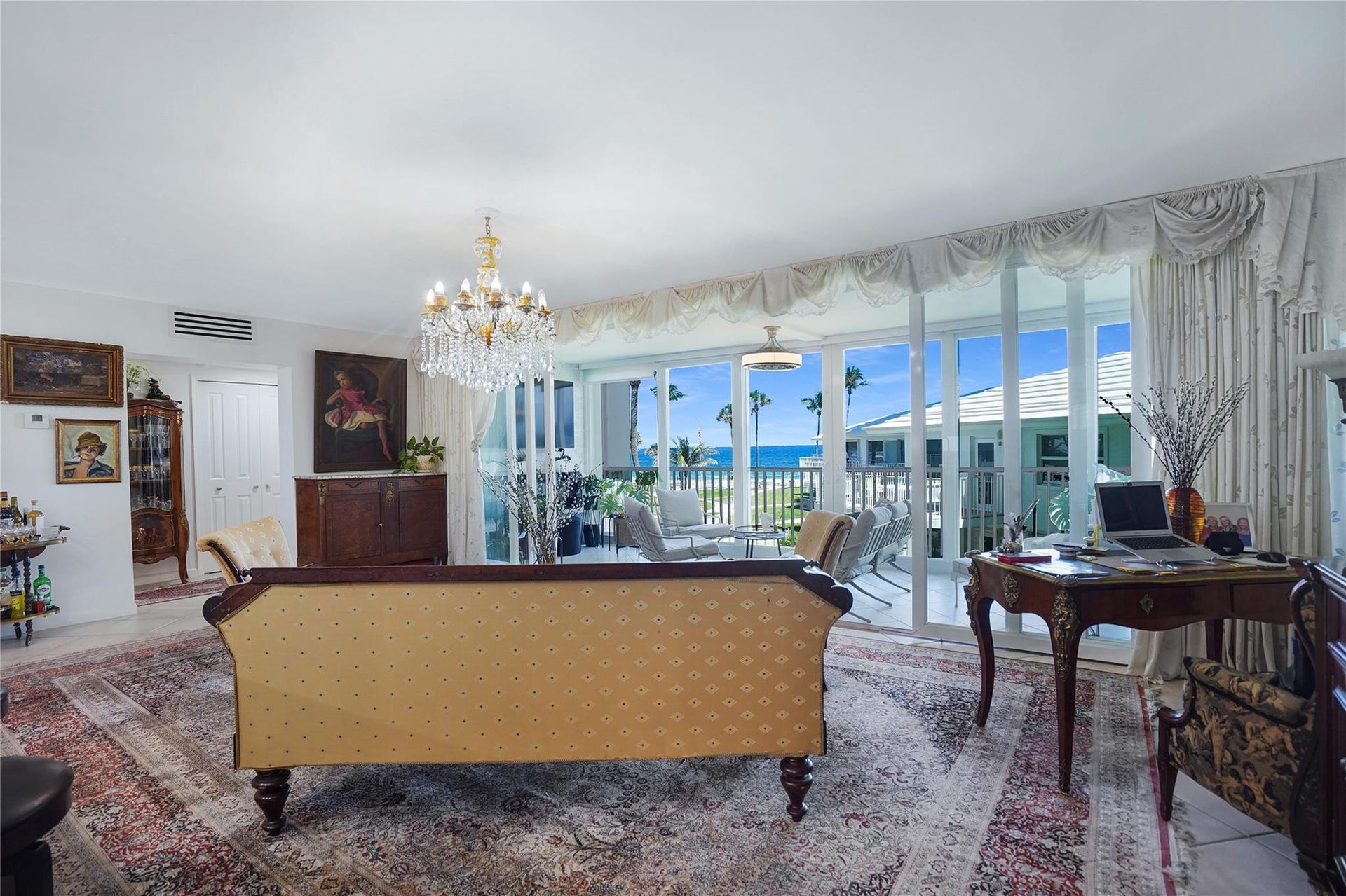 1530 S Ocean Boulevard, #203, Lauderdale By The Sea, FL 33062 The living room is adjacent to the enclosed veranda.