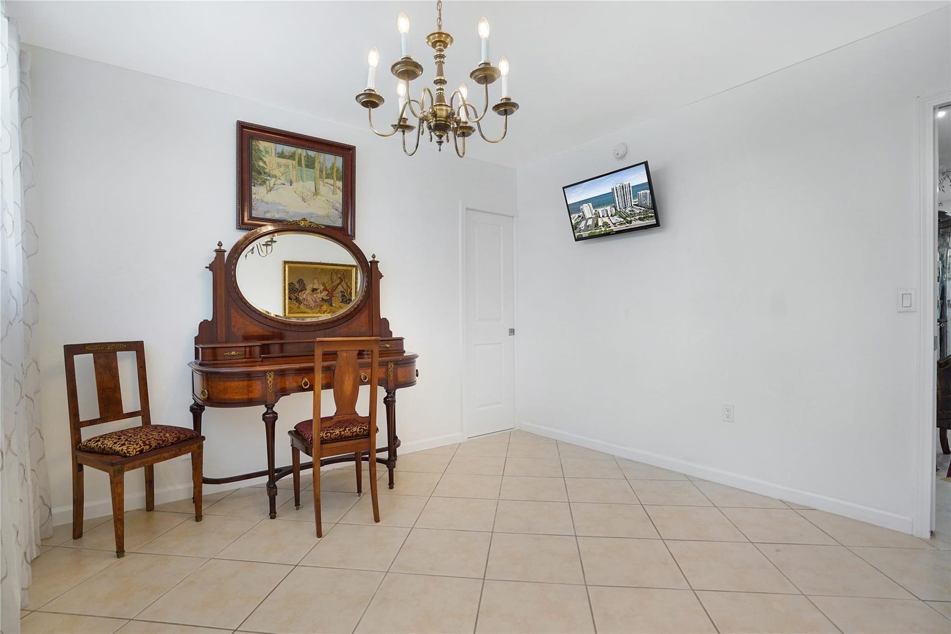 1530 S Ocean Boulevard, #203, Lauderdale By The Sea, FL 33062 The door to the right of the furniture leads into the second bathroom.