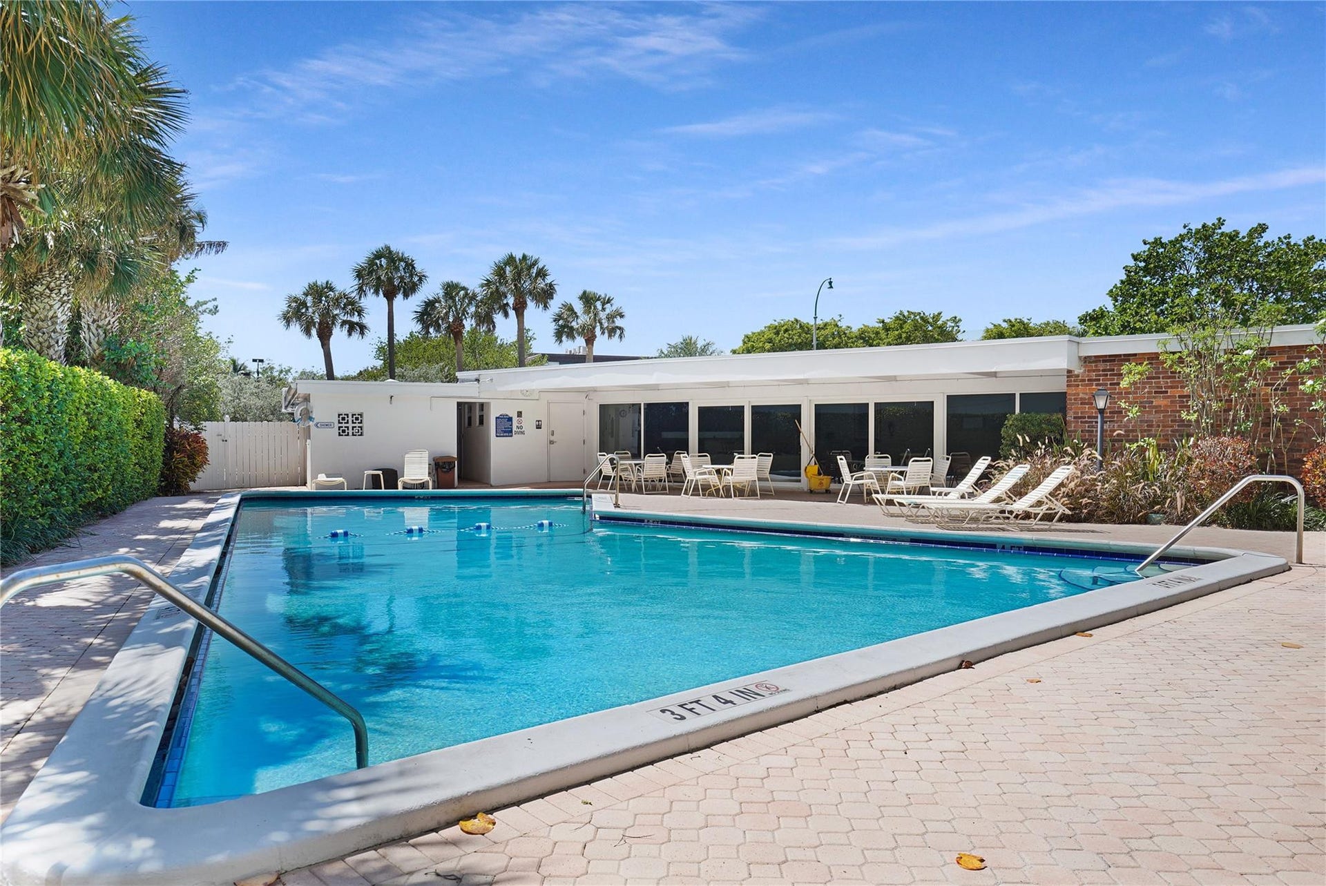 1530 S Ocean Boulevard, #203, Lauderdale By The Sea, FL 33062 The building in the background has kitchen facilities for gatherings.