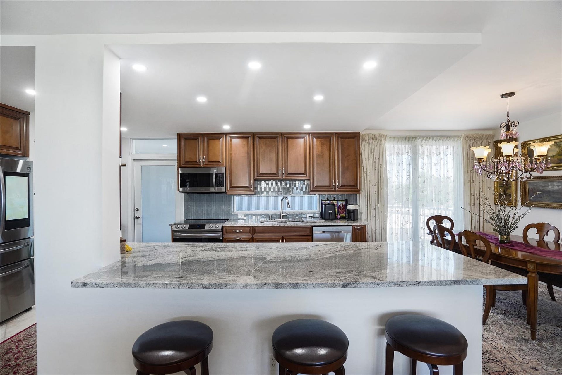 1530 S Ocean Boulevard, #203, Lauderdale By The Sea, FL 33062 There is a window behind the sink.