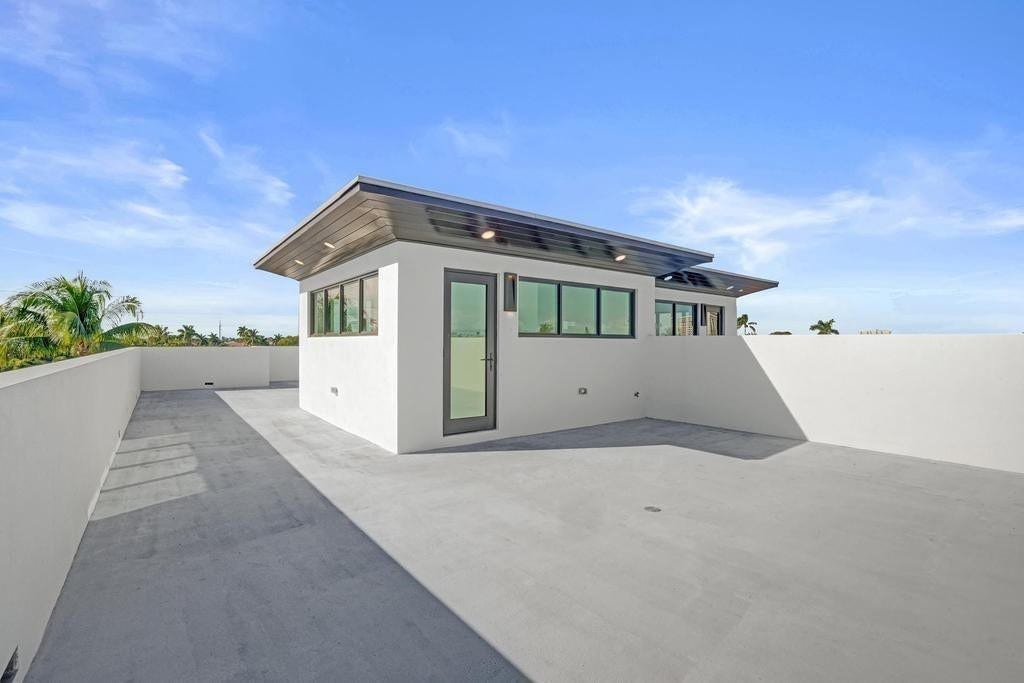 Rooftop Terrace  Private third-floor sanctuary with east, west, and southern exposures. Accommodates future needs such as generator placement and elevated mechanical equipmentenhancing resilience while preserving outdoor living below.