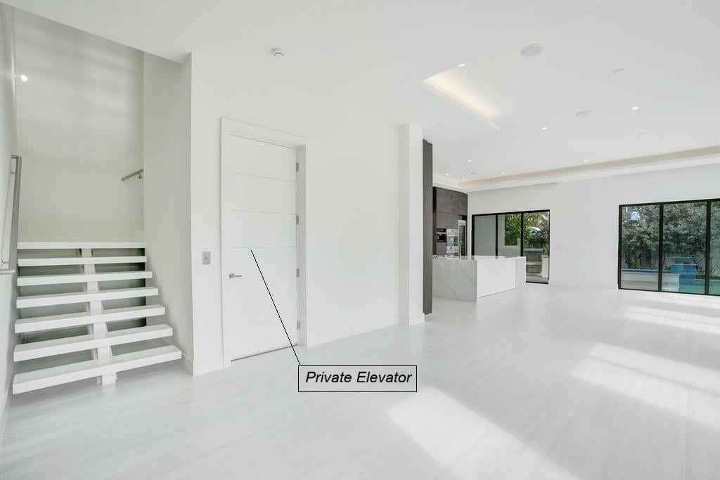 Entertaining Space.. Living Room Designed for easy flow between Kitchen and Outdoor Spaces.