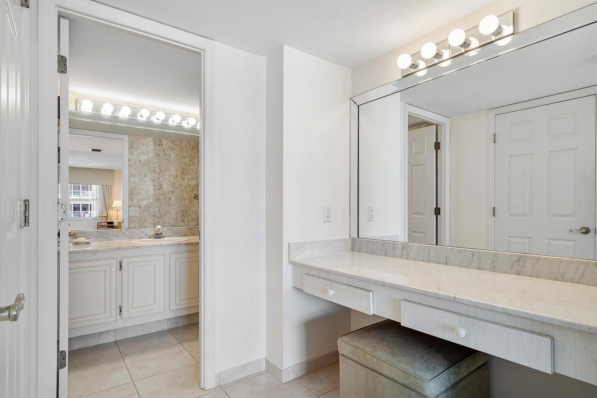 DRESSING AREA IN MASTER BEDROOM OUTSIDE PRIMARY BATHROOM