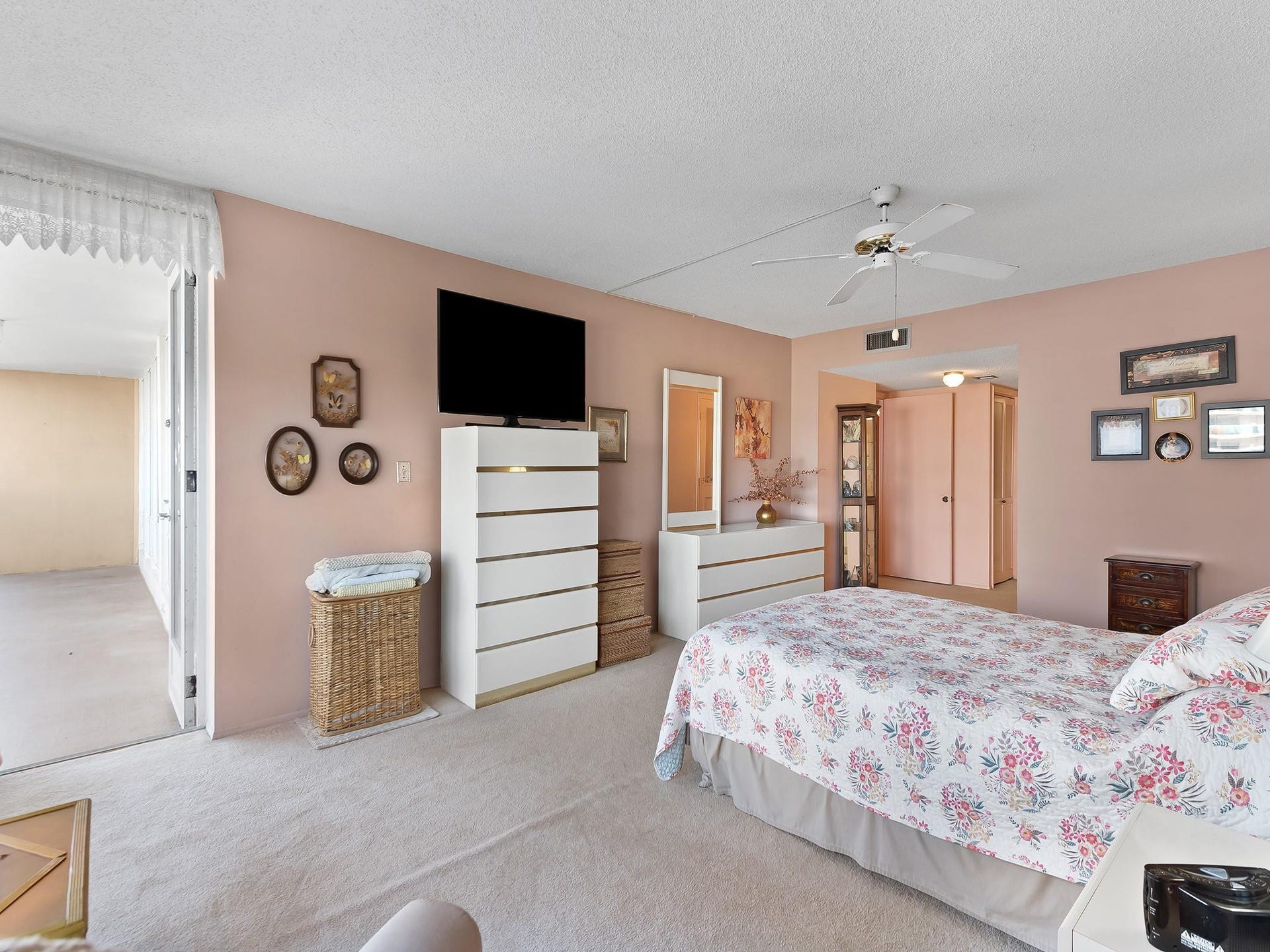 BEDROOM BOASTS 2 LARGE WALK-IN CLOSETS