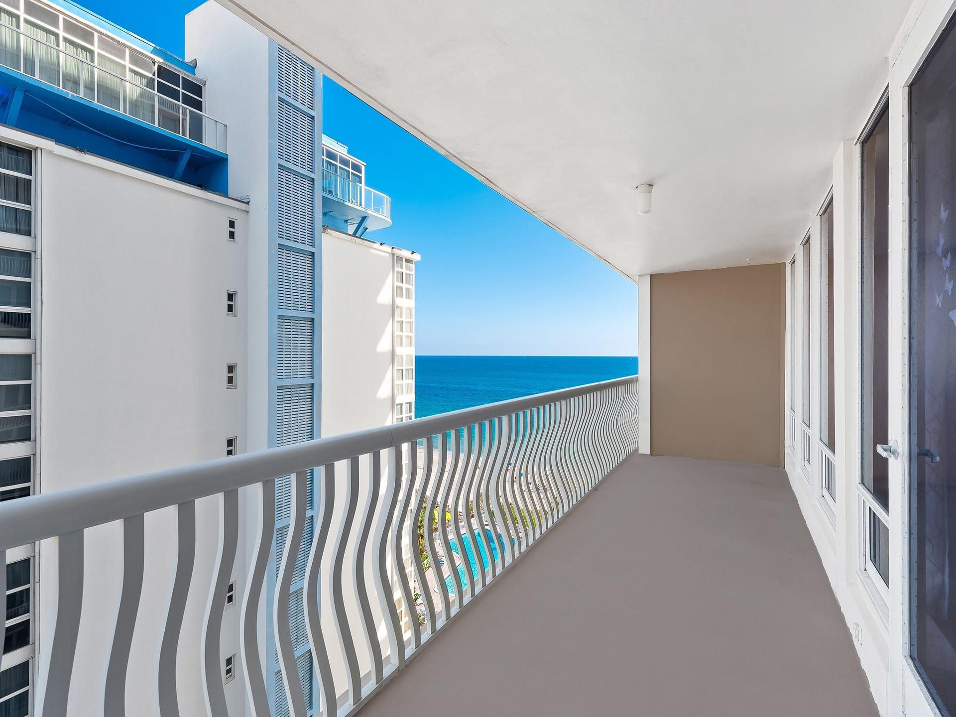 PRIMARY BEDROOM BALCONY ACCESS