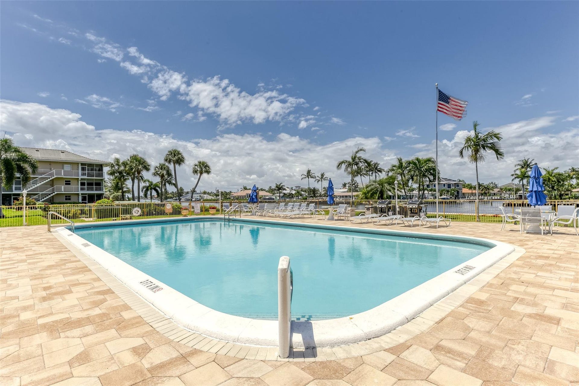 Community pool is located right on the main intracoastal and just steps from your front patio and the perfect place to relax, swim and sunbathe