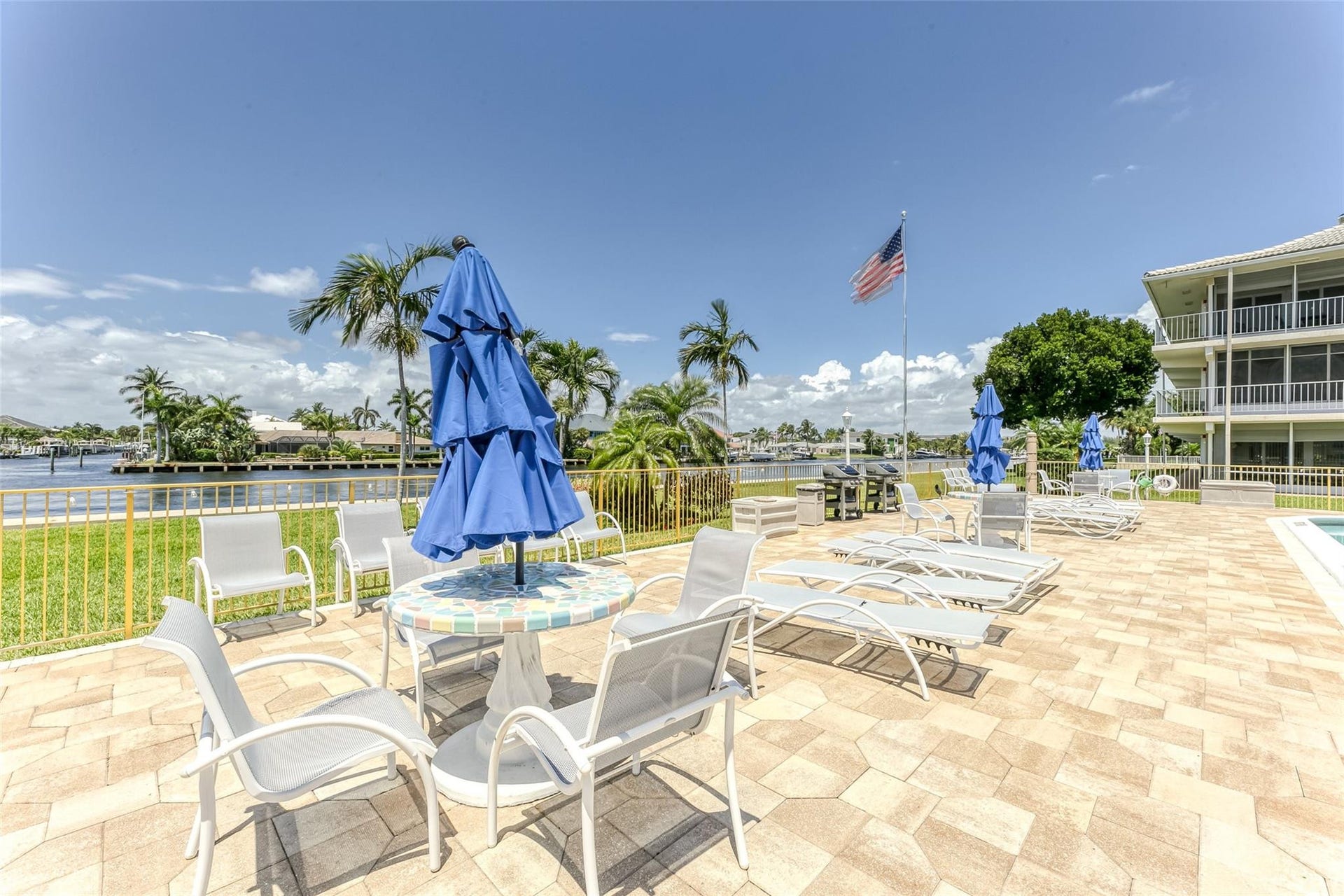 Tons of seating around pool with the perfect relaxing space to boat watch