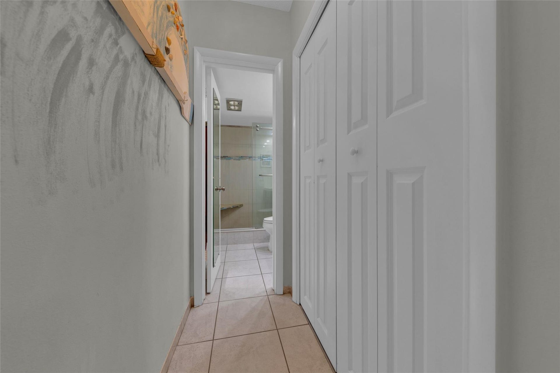 Hallway from master bedroom into bathroom