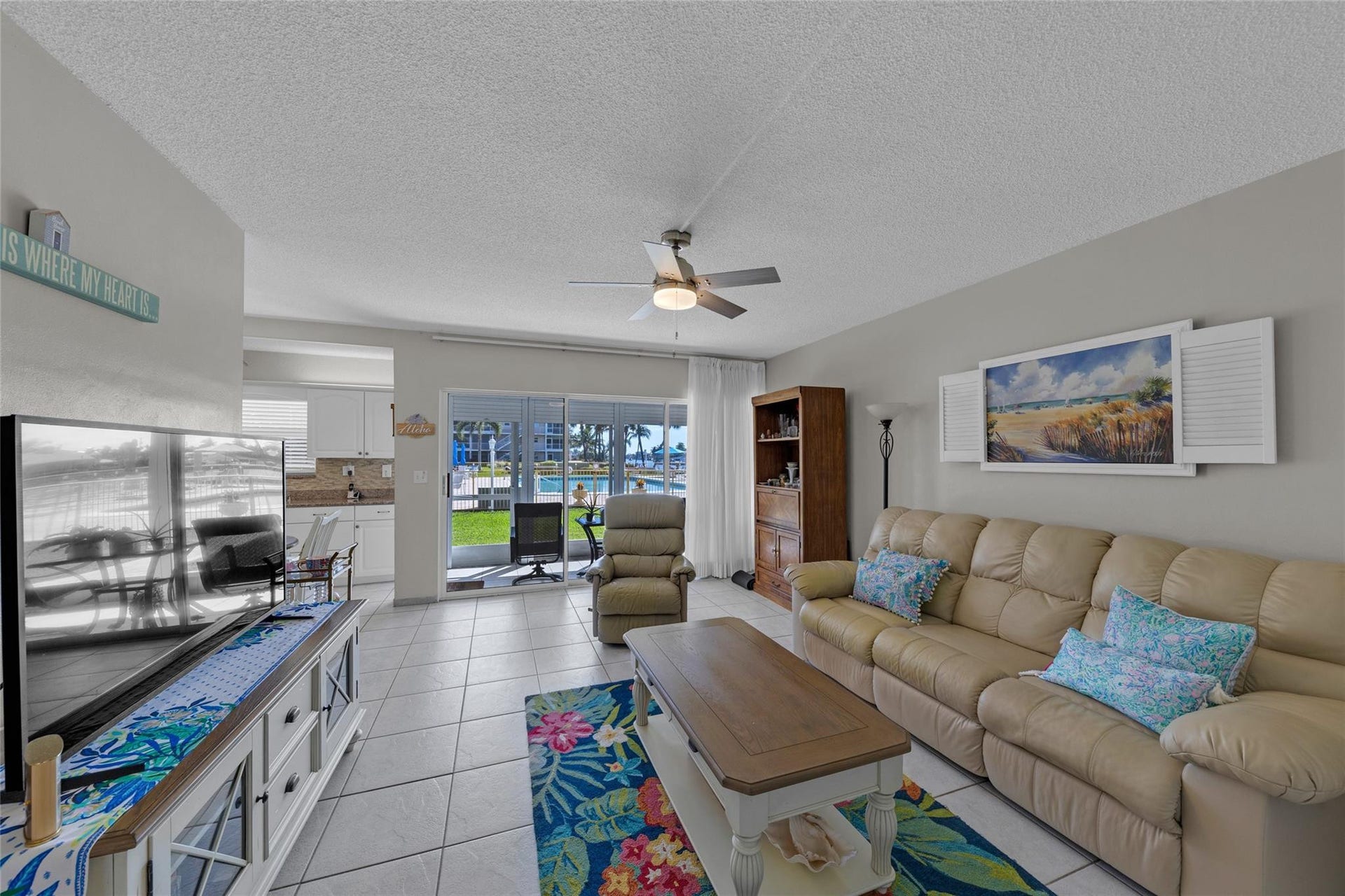 Large and spacious living room with sliders to screened patio