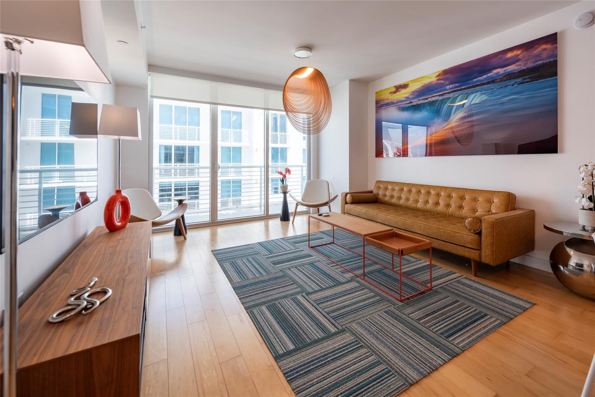 Modern and inviting, all doors lead to the full width balcony