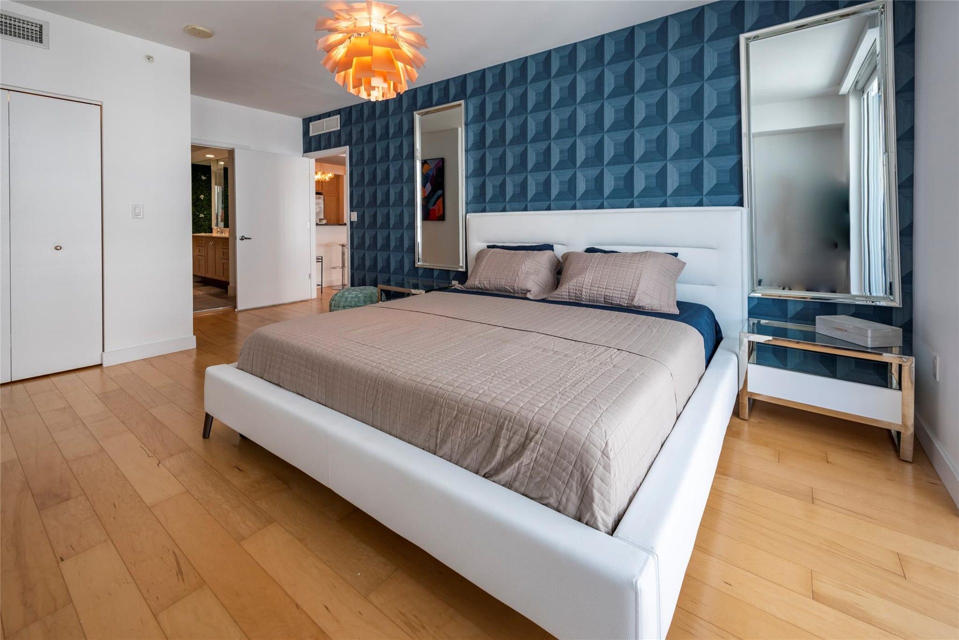 Primary bedroom with ensuite bath and walk in closet