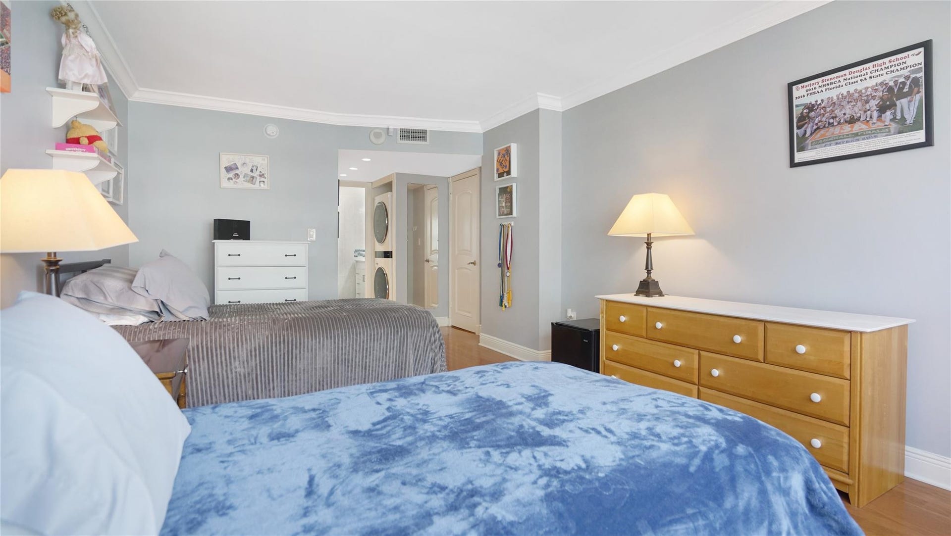 The second bedroom has a walk in closet, the washer and dryer and an en suite bathroom.