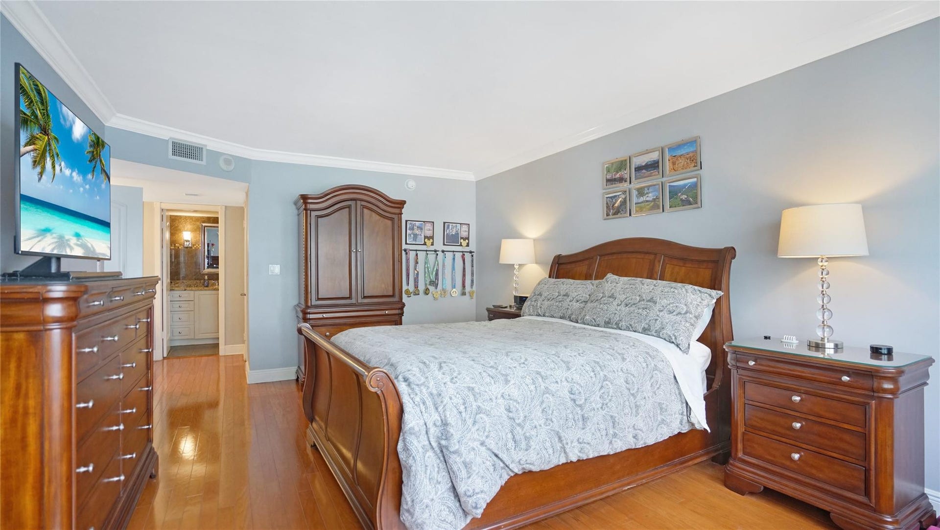 The primary bedroom leads to the en suite primary bathroom.