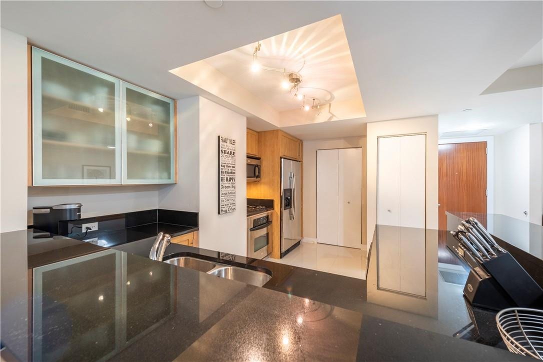 washer/dryer behind bifold door